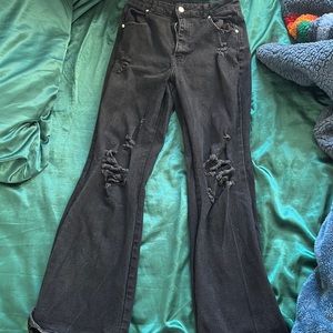 Black ripped flared jeans